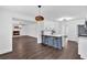 Modern kitchen, white cabinets, stainless appliances, island with seating at 2586 Abbotts Glen Nw Dr, Acworth, GA 30101
