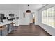 The kitchen has stainless appliances, white cabinets, and a breakfast bar with seating at 2586 Abbotts Glen Nw Dr, Acworth, GA 30101