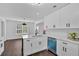 Bright kitchen features white cabinets, stainless steel appliances, and stylish countertops at 2586 Abbotts Glen Nw Dr, Acworth, GA 30101