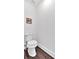 Minimalist powder room with modern toilet and graphic art at 2586 Abbotts Glen Nw Dr, Acworth, GA 30101