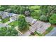 Picturesque aerial view showcasing a neighborhood with lush landscaping and well-maintained homes at 4445 Vanadium Bend, Cumming, GA 30040