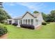 Spacious backyard with lush lawn and patio, great for entertaining and relaxation at 4445 Vanadium Bend, Cumming, GA 30040