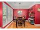 Elegant dining room with hardwood floors and natural light at 4445 Vanadium Bend, Cumming, GA 30040