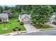 Charming home with a well-maintained lawn, inviting curb appeal and a two-car garage at 4445 Vanadium Bend, Cumming, GA 30040