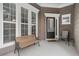 Inviting front porch with seating, perfect for enjoying the outdoors at 4445 Vanadium Bend, Cumming, GA 30040