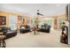 Spacious living room with fireplace, neutral carpet, and ample natural light at 4445 Vanadium Bend, Cumming, GA 30040