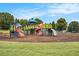 Colorful community playground with slides, climbing structures, and swings for Gathering fun at 4445 Vanadium Bend, Cumming, GA 30040