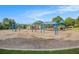 View of the community playground with swings, slides, and covered area for outdoor activities at 4445 Vanadium Bend, Cumming, GA 30040