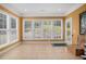 Bright sunroom featuring large windows that offer plenty of natural light at 4445 Vanadium Bend, Cumming, GA 30040