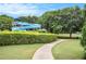 Community water slide and walking path surrounded by mature landscaping at 4445 Vanadium Bend, Cumming, GA 30040