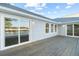 Spacious deck with sliding glass doors overlooking a beautiful landscape at 9058 Woodlake Lane, Villa Rica, GA 30180