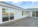 Spacious wooden deck with large sliding doors providing outdoor access at 9058 Woodlake Lane, Villa Rica, GA 30180