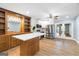 Eat-in kitchen with stainless steel appliances and custom cabinetry at 9058 Woodlake Lane, Villa Rica, GA 30180