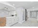 Well-designed kitchen with ample cabinet space, a breakfast bar, and open access to adjacent living areas at 9058 Woodlake Lane, Villa Rica, GA 30180