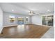 Living room with large windows and sliding doors offering outdoor views and access at 9058 Woodlake Lane, Villa Rica, GA 30180