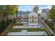 A well-maintained home with a multi-level deck overlooking a landscaped backyard and path leading to the waterfront at 9058 Woodlake Lane, Villa Rica, GA 30180