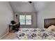 Bedroom with a bed, vaulted ceilings, and windows at 2020 Walking Horse Trl, Cumming, GA 30041
