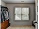 Walk-in closet with window at 2020 Walking Horse Trl, Cumming, GA 30041