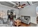 Cozy living room featuring coffered ceiling, hardwood floors, and comfortable sofas at 2020 Walking Horse Trl, Cumming, GA 30041