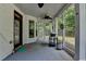 Screened in porch with ceiling fan, grill and outdoor seating at 2020 Walking Horse Trl, Cumming, GA 30041