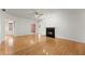 Bright living room with hardwood floors and fireplace at 2620 Dr Bramblett Rd, Cumming, GA 30028