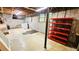 Unfinished basement with laundry area, shelving, and concrete walls, a blank canvas for custom design at 1110 Blackwell Rd, Marietta, GA 30066