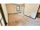 Empty bedroom with neutral carpeting, closet, window, and base trim for a clean slate at 1110 Blackwell Rd, Marietta, GA 30066