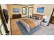 Staged main bedroom showcasing a large bed, stylish furniture, and serene decor at 1110 Blackwell Rd, Marietta, GA 30066