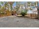 Backyard view with sports court, red shed and partial fenced area around the pool at 2775 Hogan Rd, Atlanta, GA 30344