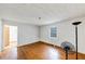 Bright bedroom with wood floors and a large window, perfect for relaxation at 2775 Hogan Rd, Atlanta, GA 30344
