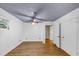 Large, bright bedroom with wood-look floors and multiple closets at 2775 Hogan Rd, Atlanta, GA 30344