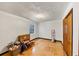 Bedroom with wood floors, a window, and closet space at 2775 Hogan Rd, Atlanta, GA 30344