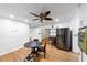 Eat-in kitchen with black appliances and a modern ceiling fan at 2775 Hogan Rd, Atlanta, GA 30344