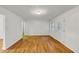 Cozy room features hardwood floors and neutral walls at 2775 Hogan Rd, Atlanta, GA 30344