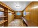 Office featuring wood panels and built-in shelves with ample storage at 2775 Hogan Rd, Atlanta, GA 30344
