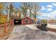 Pool house with garage and adjacent patio at 2775 Hogan Rd, Atlanta, GA 30344