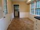 Kitchen with a view of a laundry area at 3026 Hidden Forest Dr, Snellville, GA 30078