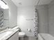 Bathroom featuring granite countertops and a shower/tub combo with tiled walls at 3304 Pine Heights Ne Dr, Atlanta, GA 30324