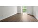 Bright bedroom with wood flooring, natural light and a window with green view at 3304 Pine Heights Ne Dr, Atlanta, GA 30324