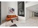 Elegant lobby area with comfortable seating, contemporary art, and a view of the building's elevator at 3304 Pine Heights Ne Dr, Atlanta, GA 30324