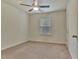 Carpeted bedroom with ceiling fan and natural light at 2243 Knoxhill Se Vw, Smyrna, GA 30082
