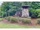 Westhill neighborhood entrance sign nestled amongst mature trees and lush landscaping at 2243 Knoxhill Se Vw, Smyrna, GA 30082