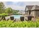 Community pool with lounge chairs for relaxing by the water at 2243 Knoxhill Se Vw, Smyrna, GA 30082