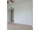 Neutral bedroom with ceiling fan and doorway at 3445 Stratford Rd # 1501, Atlanta, GA 30326
