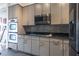 Modern kitchen featuring sleek cabinetry, stainless steel appliances, and stylish backsplash at 3445 Stratford Rd # 1501, Atlanta, GA 30326