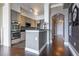 Contemporary kitchen boasts stainless steel appliances, double ovens, and sleek gray cabinetry at 3445 Stratford Rd # 1501, Atlanta, GA 30326