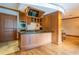 Gourmet kitchen features stainless steel appliances and a sleek island with a breakfast bar at 3445 Stratford Rd # 1501, Atlanta, GA 30326