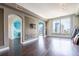 Spacious living room with hardwood floors, stylish archways, and breathtaking city views at 3445 Stratford Rd # 1501, Atlanta, GA 30326