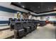 Home theater room with rows of seating at 3445 Stratford Rd # 1501, Atlanta, GA 30326