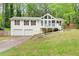 Charming two-story home features a front porch, two-car garage, and a well-maintained lawn at 3861 Hanover Ct, Marietta, GA 30062